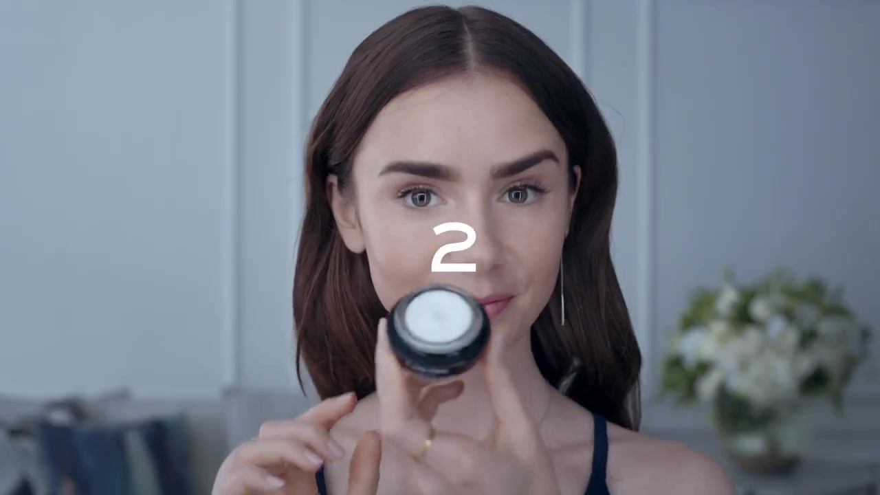 15_seconds_to_Youthful2C_Brighter_Eyes_with_Lily_Collins_-_NEW_Advanced_Genifique_Eye_Cream_015.jpg
