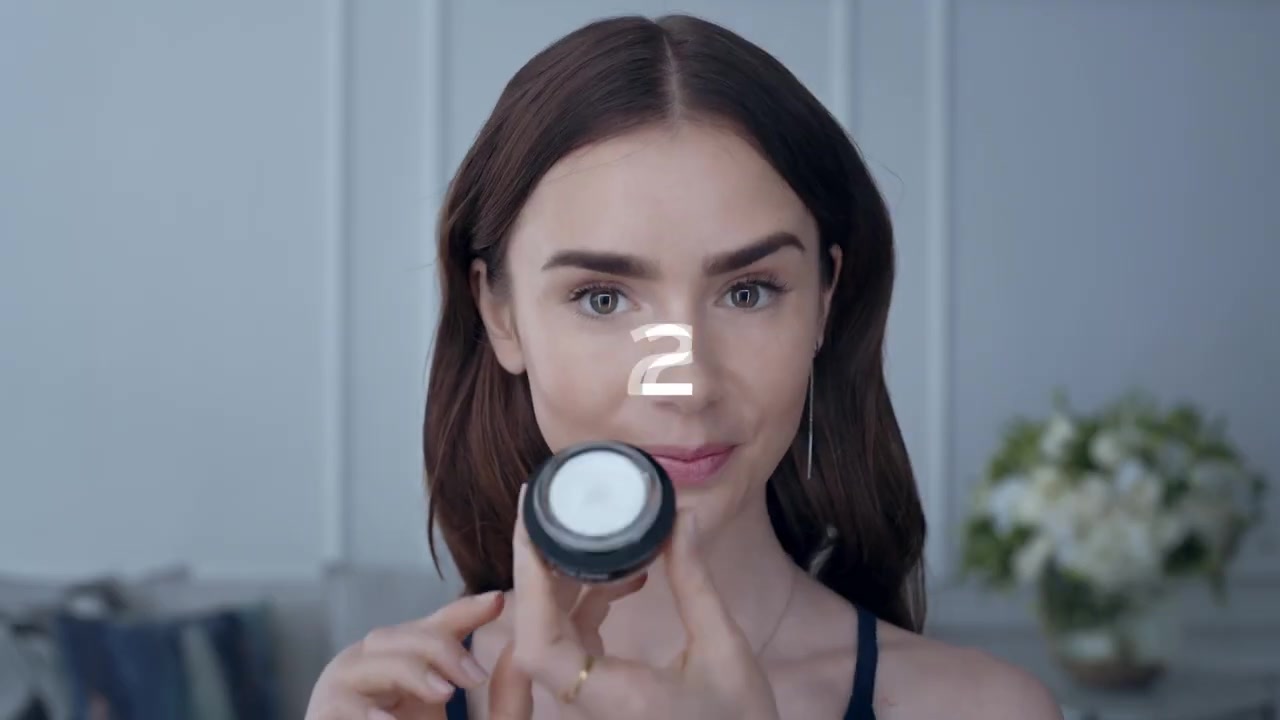 15_seconds_to_Youthful2C_Brighter_Eyes_with_Lily_Collins_-_NEW_Advanced_Genifique_Eye_Cream_016.jpg