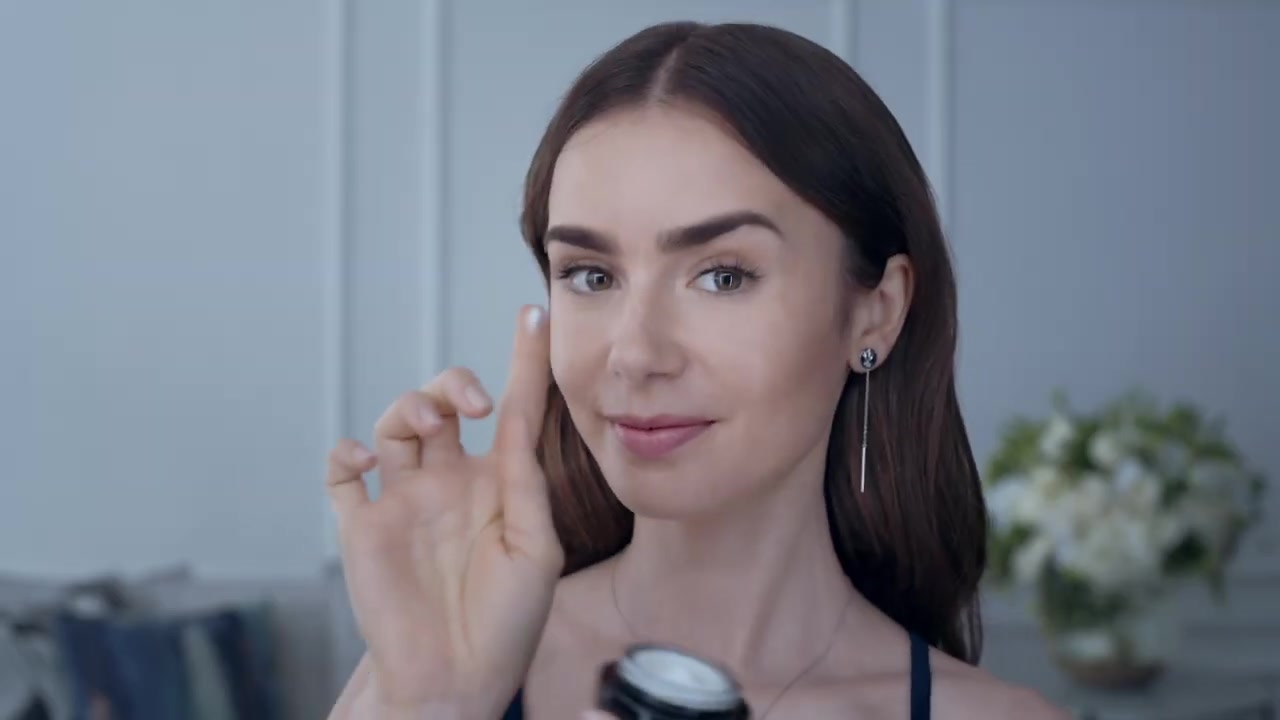 15_seconds_to_Youthful2C_Brighter_Eyes_with_Lily_Collins_-_NEW_Advanced_Genifique_Eye_Cream_020.jpg