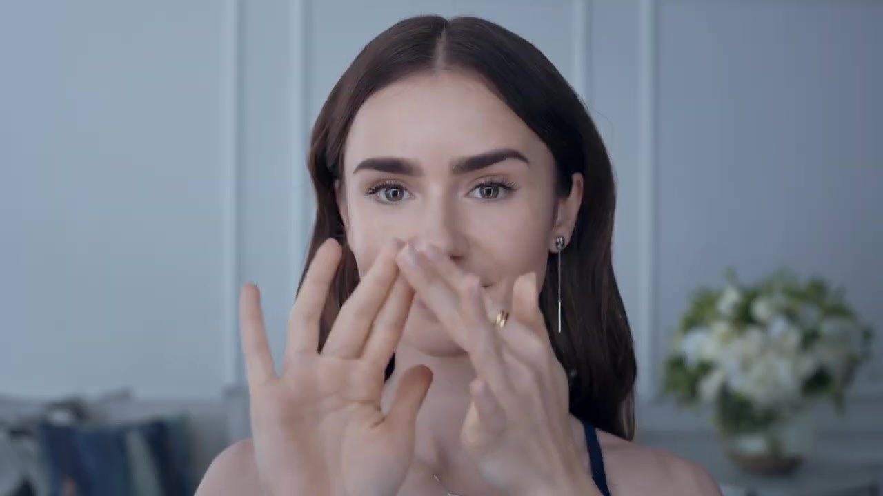 15_seconds_to_Youthful2C_Brighter_Eyes_with_Lily_Collins_-_NEW_Advanced_Genifique_Eye_Cream_024.jpg