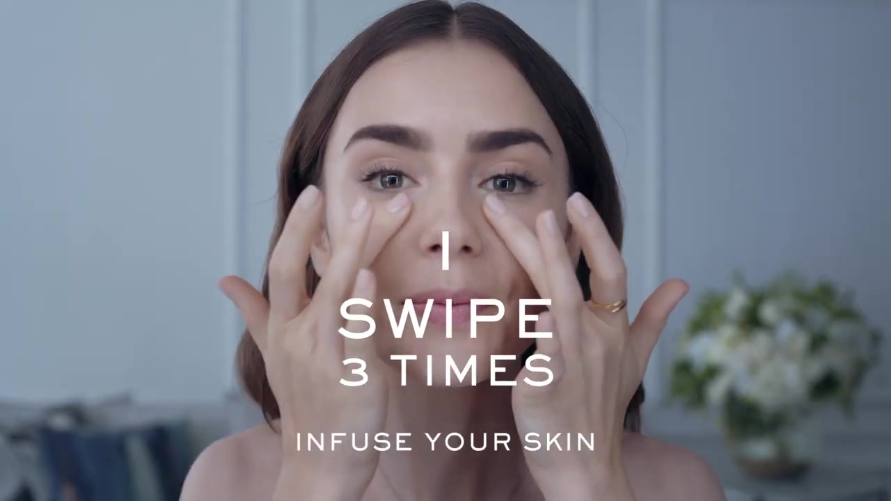 15_seconds_to_Youthful2C_Brighter_Eyes_with_Lily_Collins_-_NEW_Advanced_Genifique_Eye_Cream_031.jpg