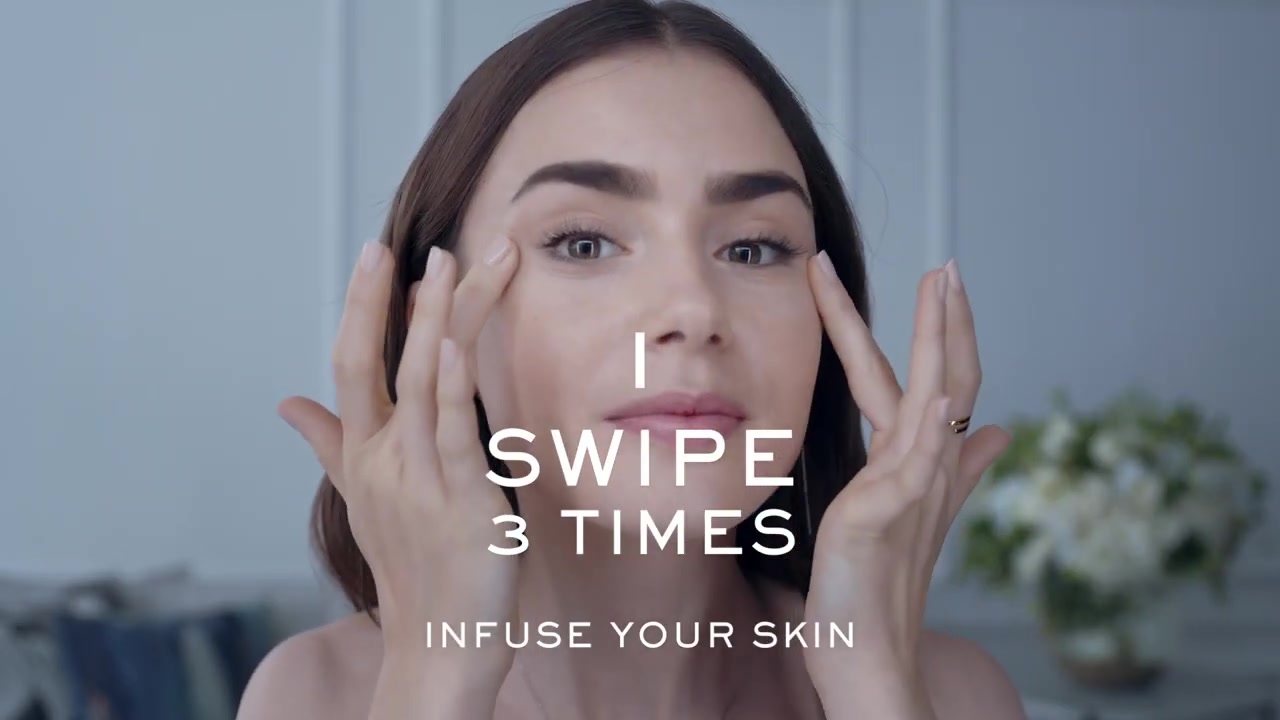 15_seconds_to_Youthful2C_Brighter_Eyes_with_Lily_Collins_-_NEW_Advanced_Genifique_Eye_Cream_035.jpg