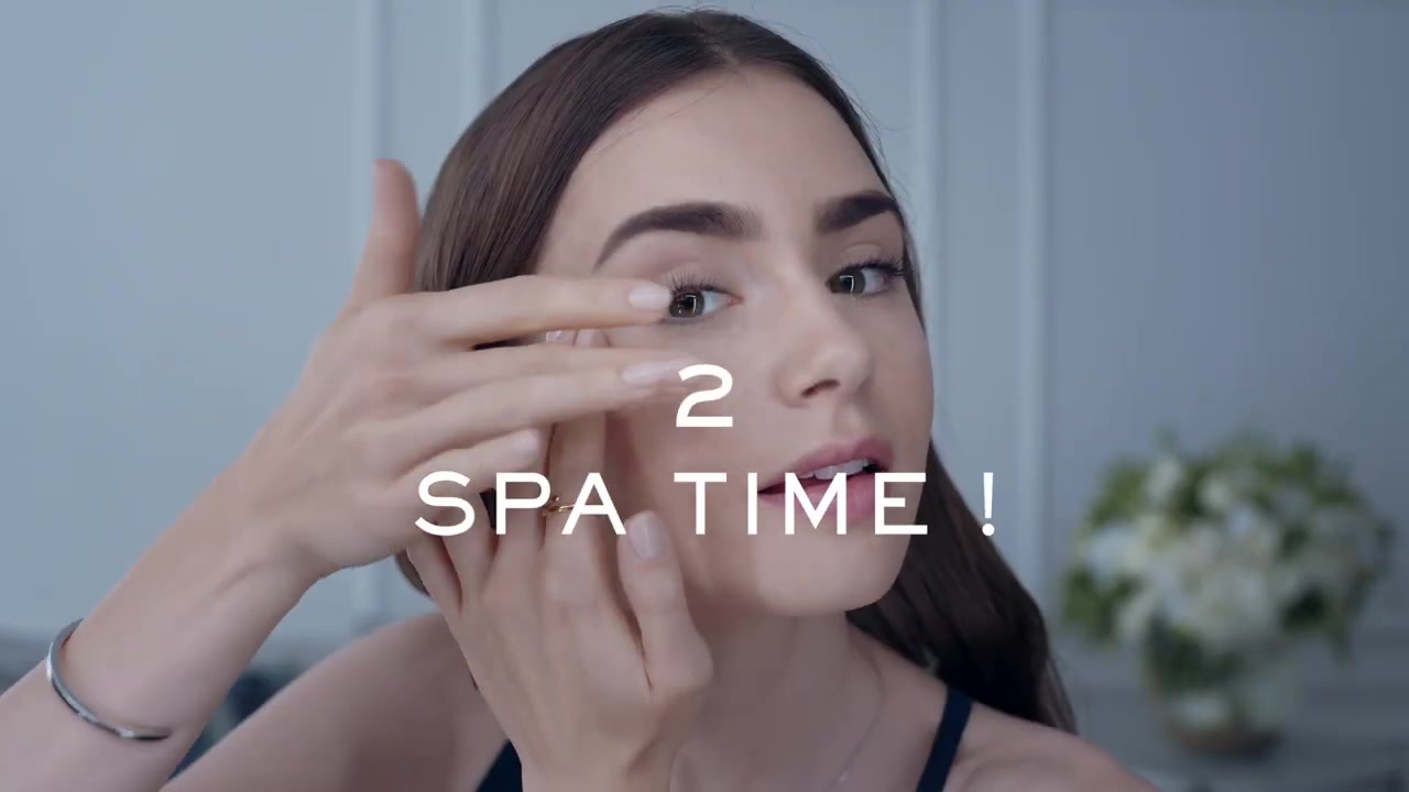 15_seconds_to_Youthful2C_Brighter_Eyes_with_Lily_Collins_-_NEW_Advanced_Genifique_Eye_Cream_058.jpg