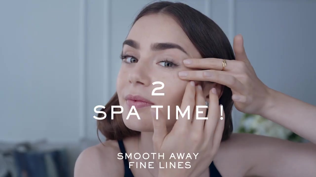 15_seconds_to_Youthful2C_Brighter_Eyes_with_Lily_Collins_-_NEW_Advanced_Genifique_Eye_Cream_066.jpg