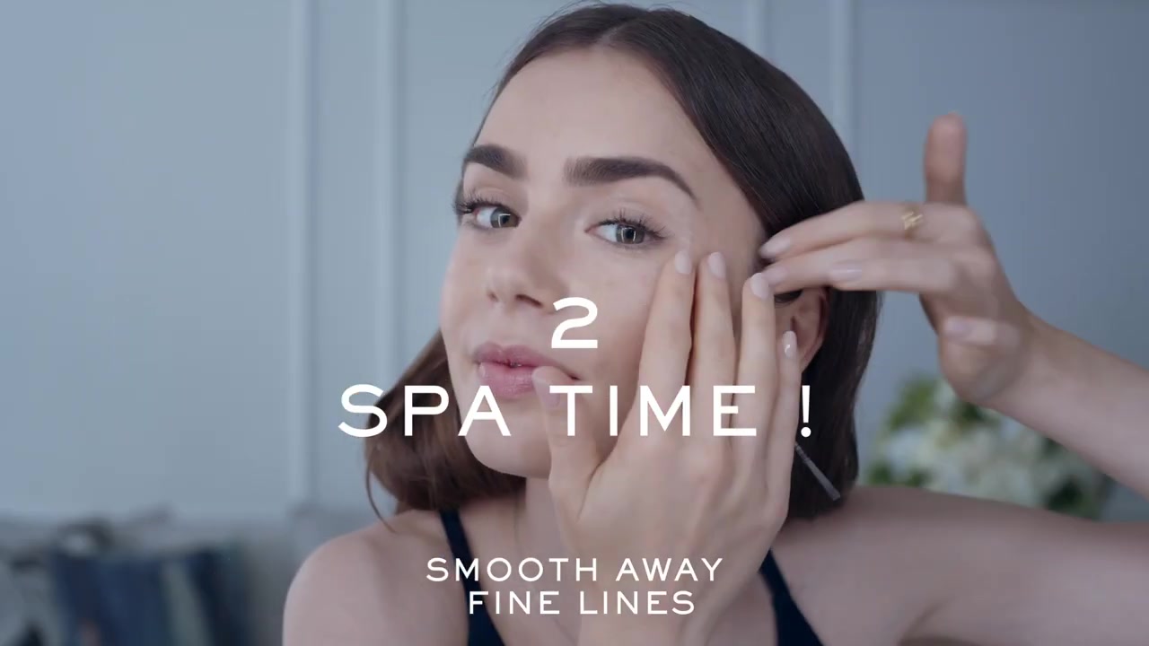 15_seconds_to_Youthful2C_Brighter_Eyes_with_Lily_Collins_-_NEW_Advanced_Genifique_Eye_Cream_068.jpg