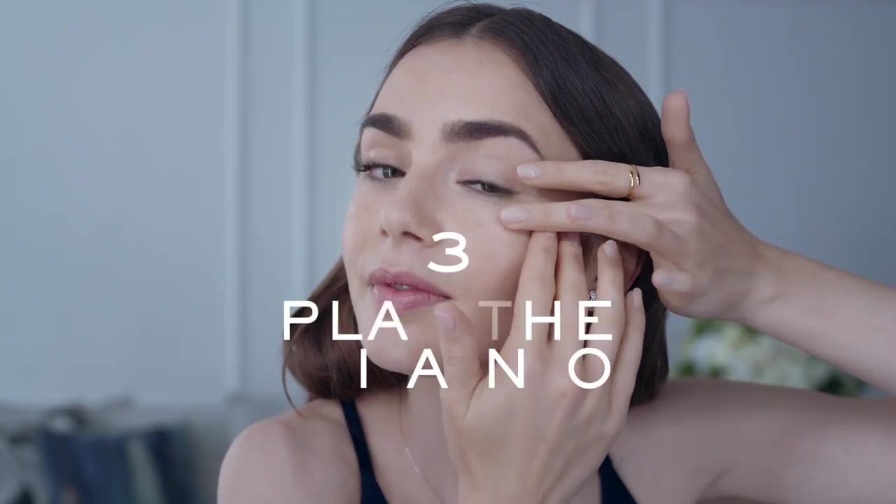 15_seconds_to_Youthful2C_Brighter_Eyes_with_Lily_Collins_-_NEW_Advanced_Genifique_Eye_Cream_070.jpg