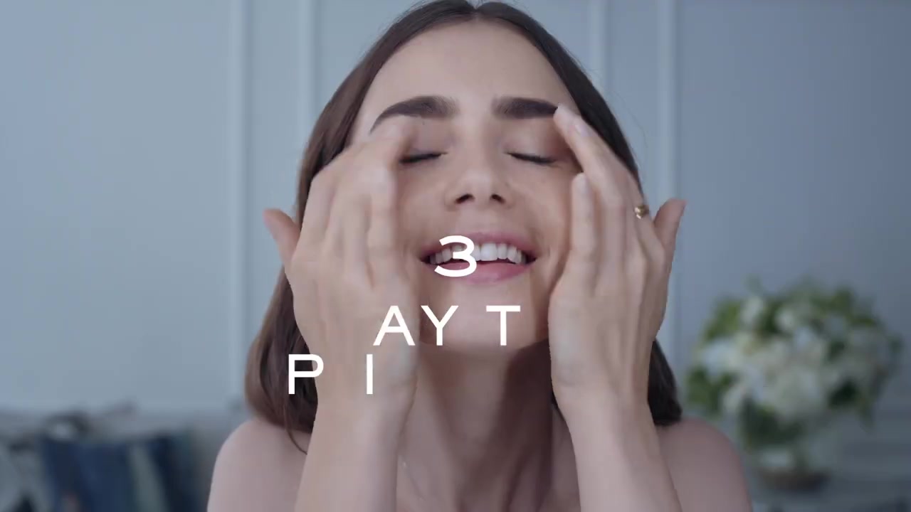 15_seconds_to_Youthful2C_Brighter_Eyes_with_Lily_Collins_-_NEW_Advanced_Genifique_Eye_Cream_072.jpg